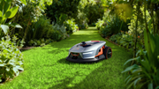Sunseeker Elite X4 robotic lawn mower, handling a complex yard