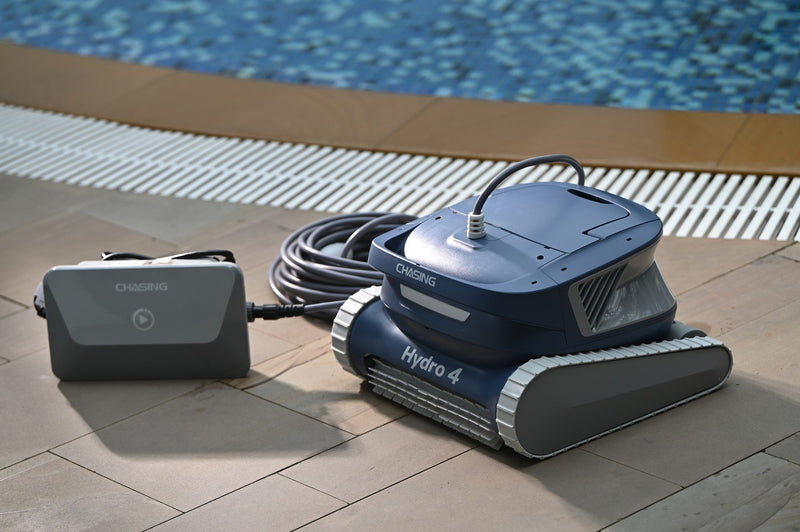 Chasing Hydro 4 corded pool cleaner with control box on a pool deck