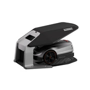 Sunseeker Elite X5 Gen 2 robotic lawn mower, on the charging station with the optional garage