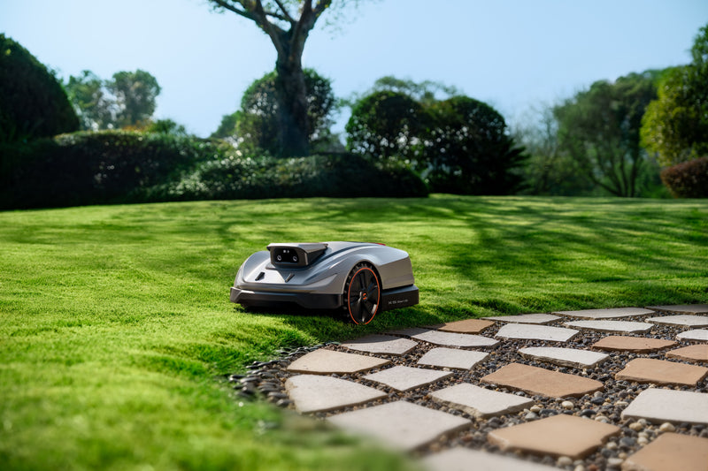 Sunseeker Elite X5 Gen 2 robotic lawn mower, mowing in daylight