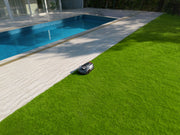 Sunseeker Elite X5 Gen 2 robotic lawn mower, wide view of the mower on a lawn