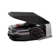 Sunseeker Elite X7 Gen 2 robotic lawn mower, docked on the charging station