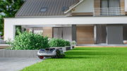 Sunseeker Elite X7 Plus Gen 2 robotic lawn mower, edge-following cutting along a border