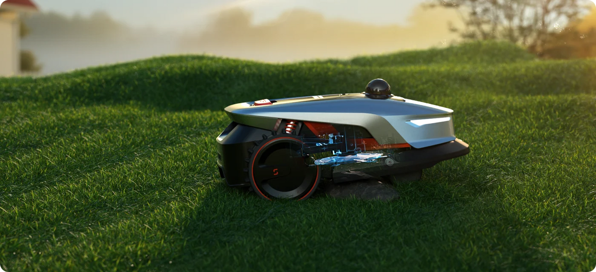 Autonomous robot lawn mower finishing an evening cut