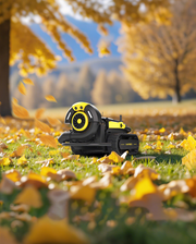 Yarbo Blower moving through autumn leaves on a lawn