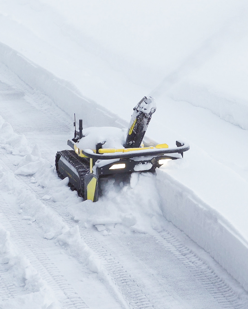 Yarbo Snow Blower clearing a snow-covered path